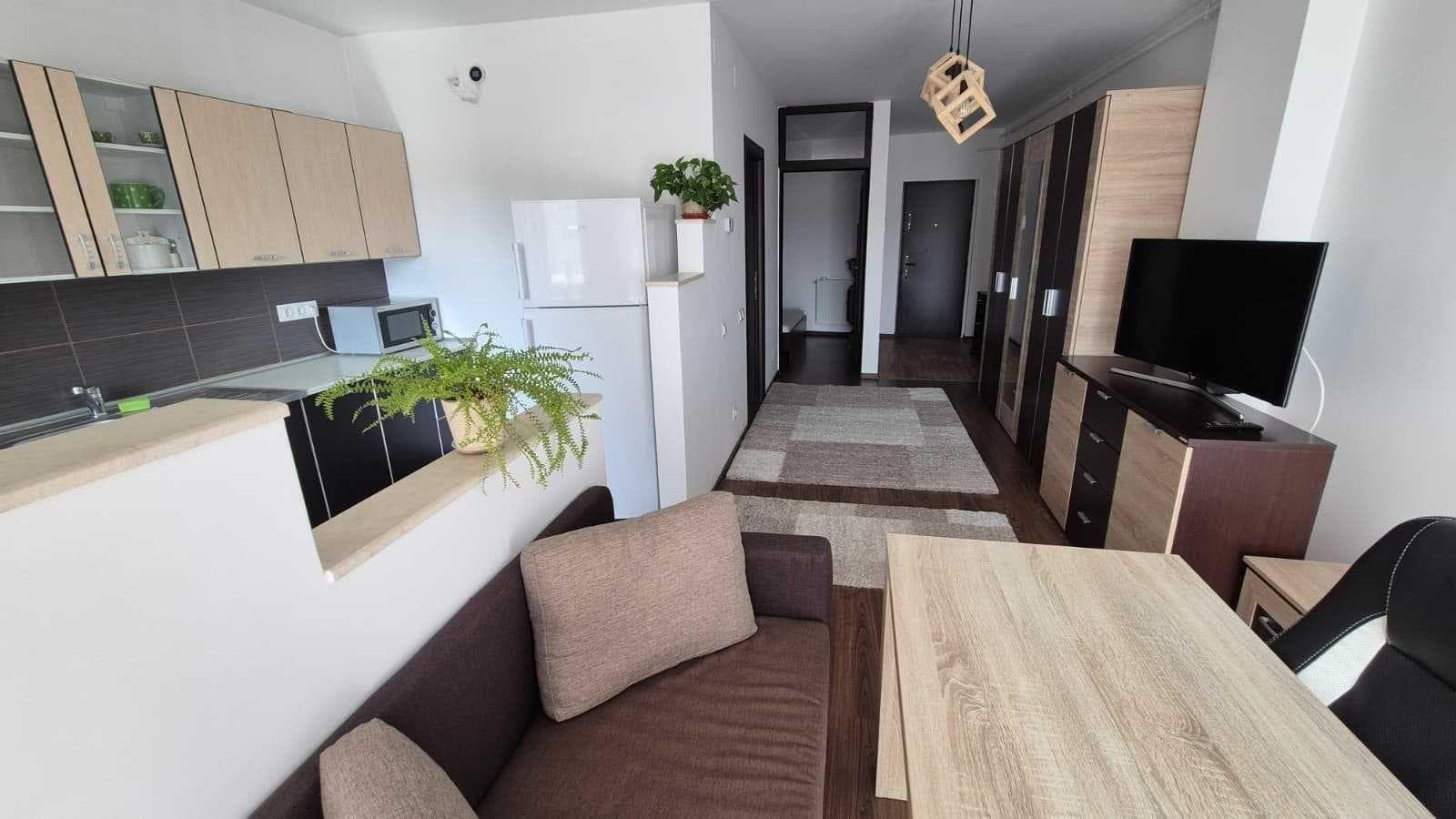 PF ofer spre închiriere apartament modern în zona The Office